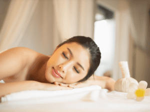 A picture of a woman receiving the best Swedish massage in Las Vegas from a Tranquil massage therapist