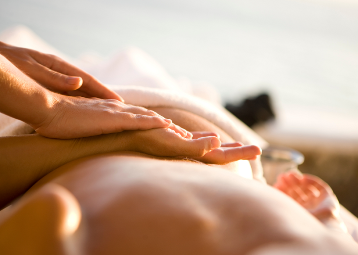 A woman getting the best massage in West Hollywood from a Tranquil massage therapist