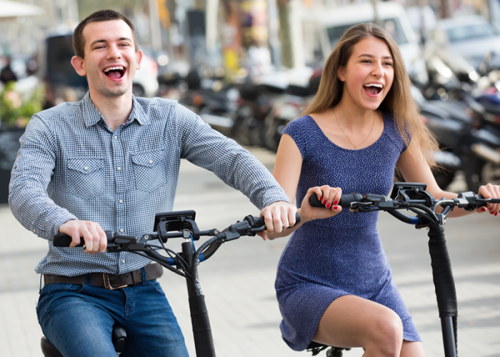 This is a picture of a couple on an electric bike tour in LA that represents a once in a lifetime thing to do in Los Angeles