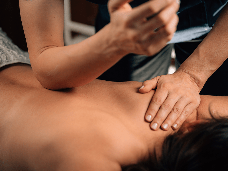 a man getting a deep tissue massage after doing a deep tissue massage near me search online