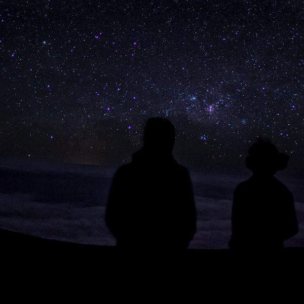 A couple from Los Angeles that works as mobile massage therapists star gazing on vacation at Sunrise Mountain in Las Vegas