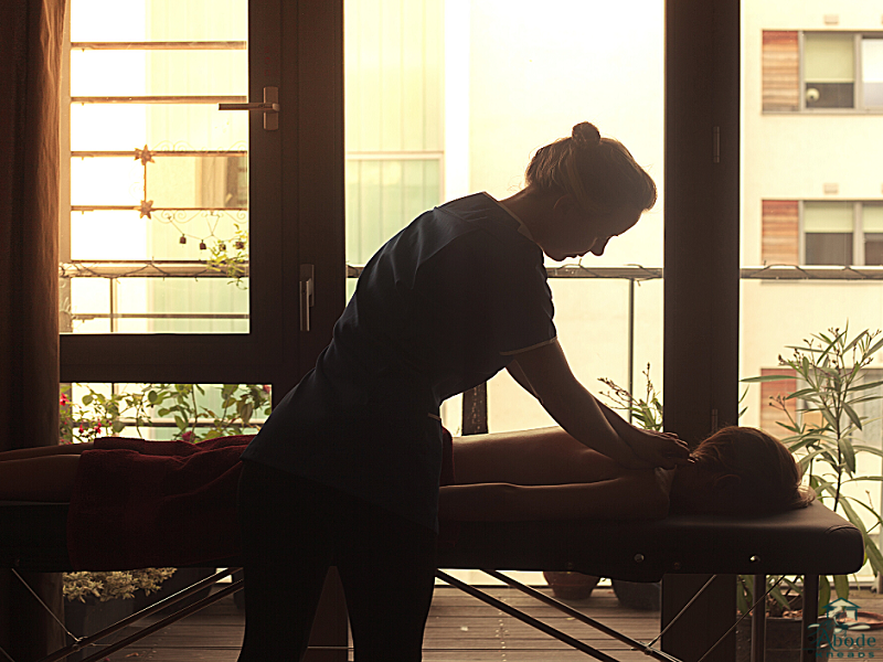 A woman enjoying a professional in-room massage in her hotel room on the the Las Vegas Strip